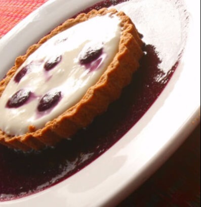 Tarta de Queso con Frambuesa en Mesón del Cid